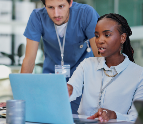 Female healthcare administrator on laptop