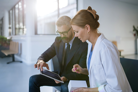 Hospital Administrator with medical staff.
